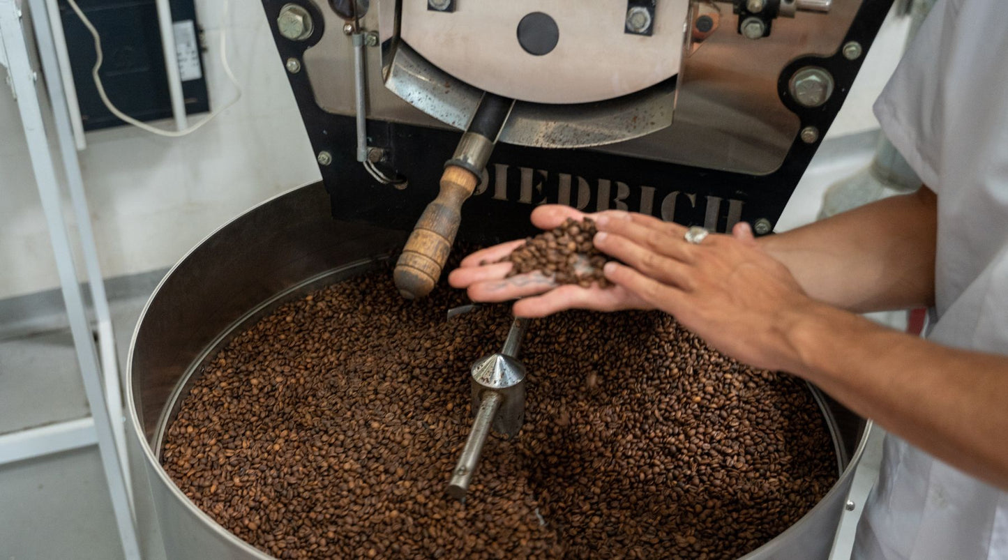 Coffee beans in a coffee roasting drum at a Perth Coffee Roaster