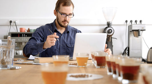 What are the best coffee beans - Man sampling the differences between coffee bean varieties