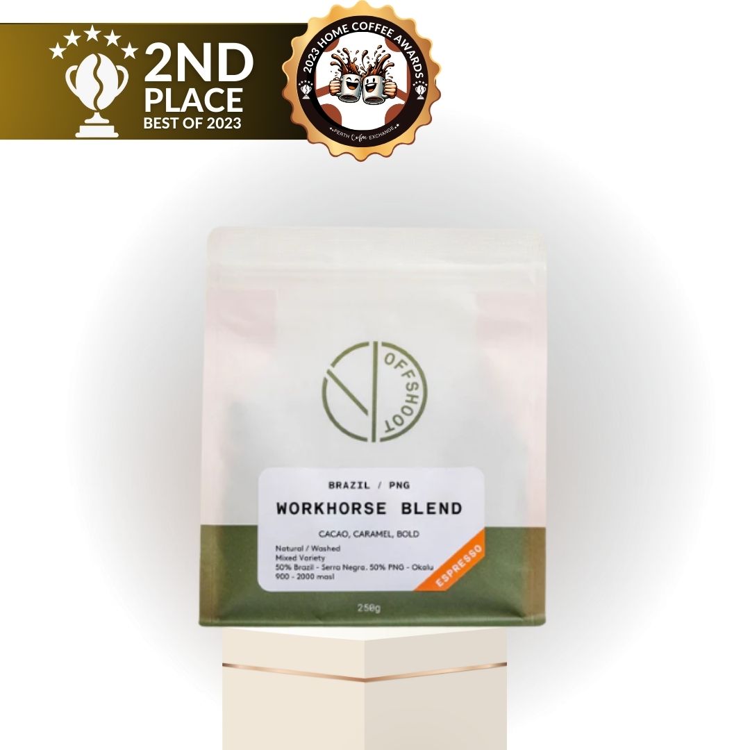 A package of Perth Coffee Exchange "Offshoot - Workhorse Blend" coffee bean bag, awarded as 2nd place Best of 2023. The packaging lists flavor notes of cocoa, caramel, and bold.