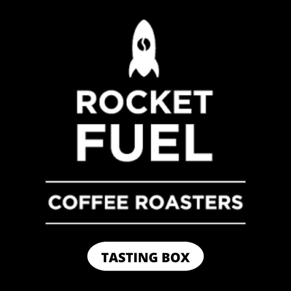 Rocketfuel tasting box with rocketfuel logo - Rocket with coffee bean icon above text that read rocket fuel coffee roasters